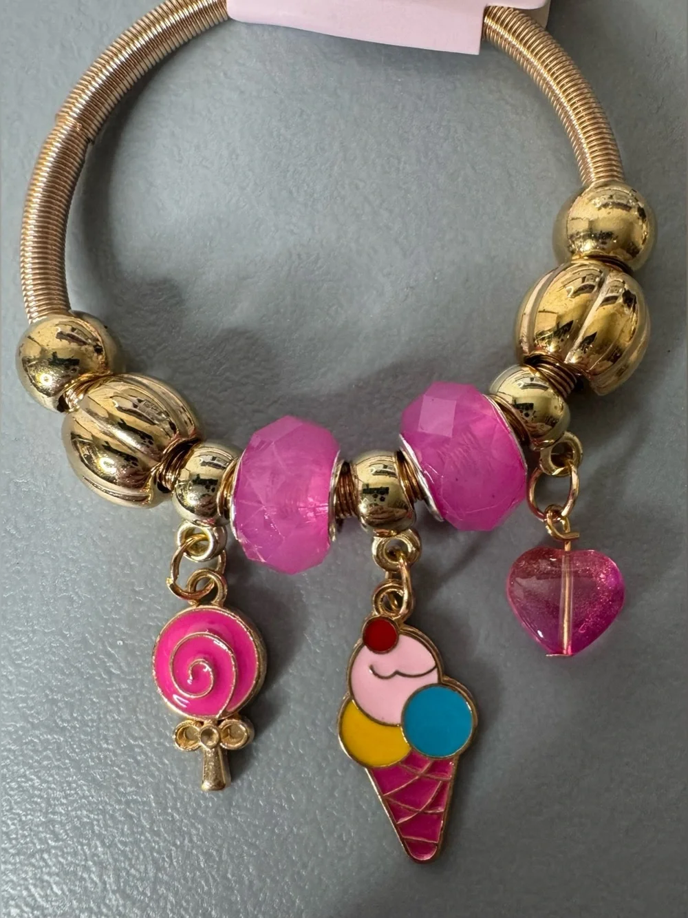 Gold Charm Bracelet with Pink Beads and Sweet Candy Charms